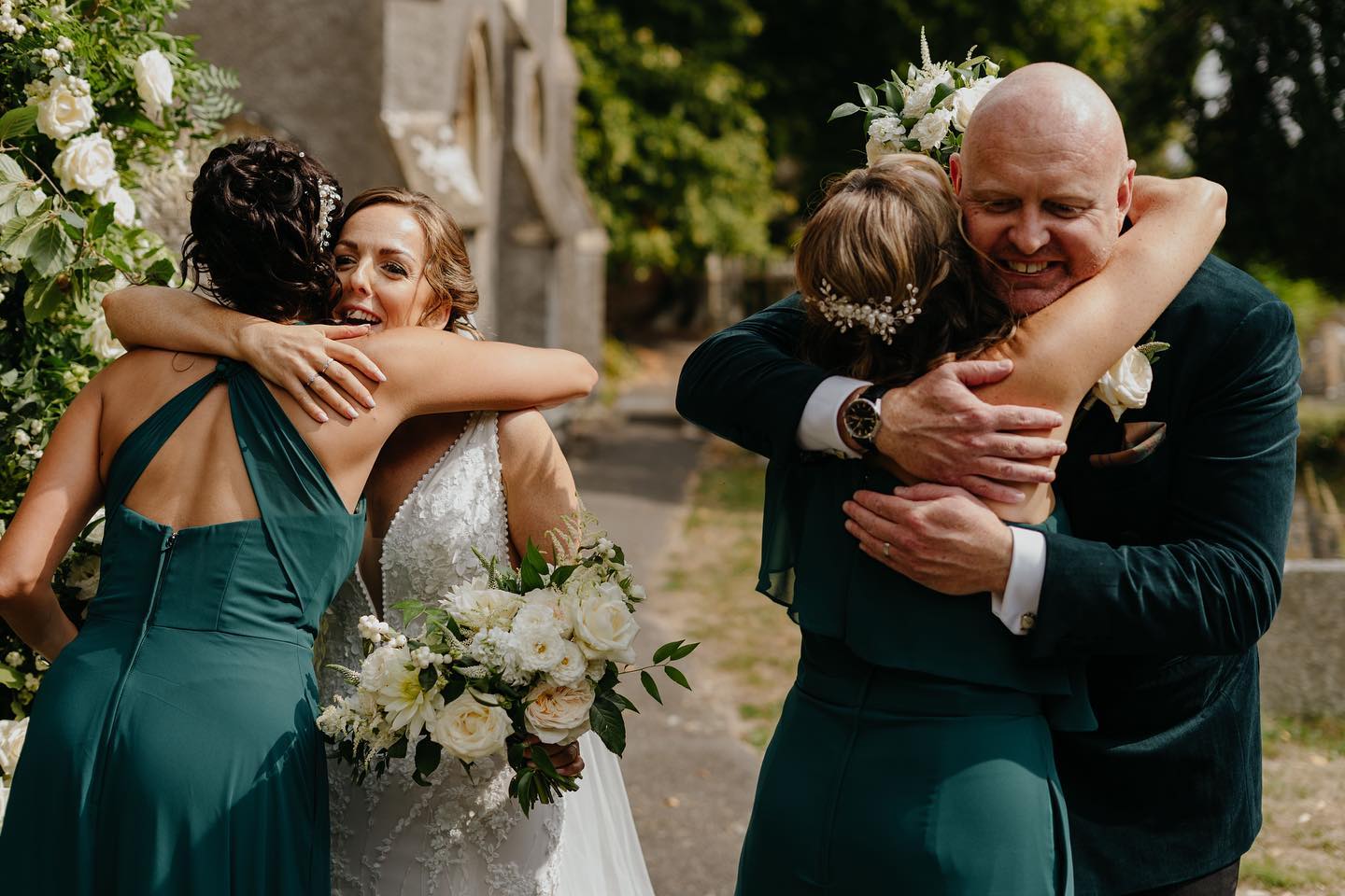 Hugs all round, strange to imagine a wedding now without hugs!